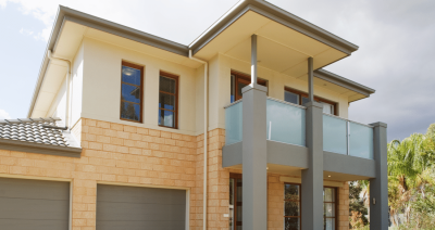 A yellow two storey home
