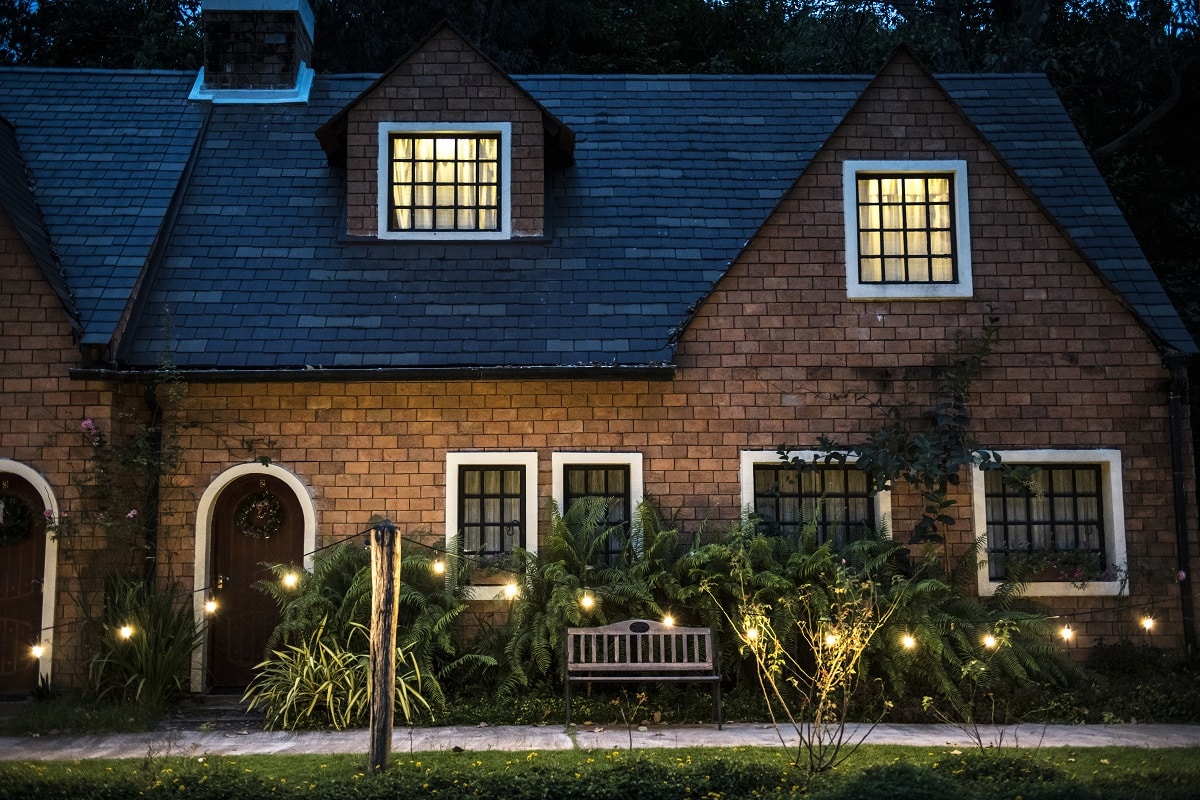 Beautiful red brick house with decorative lights